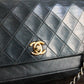Chanel sac à main Timeless en cuir noir à rabat