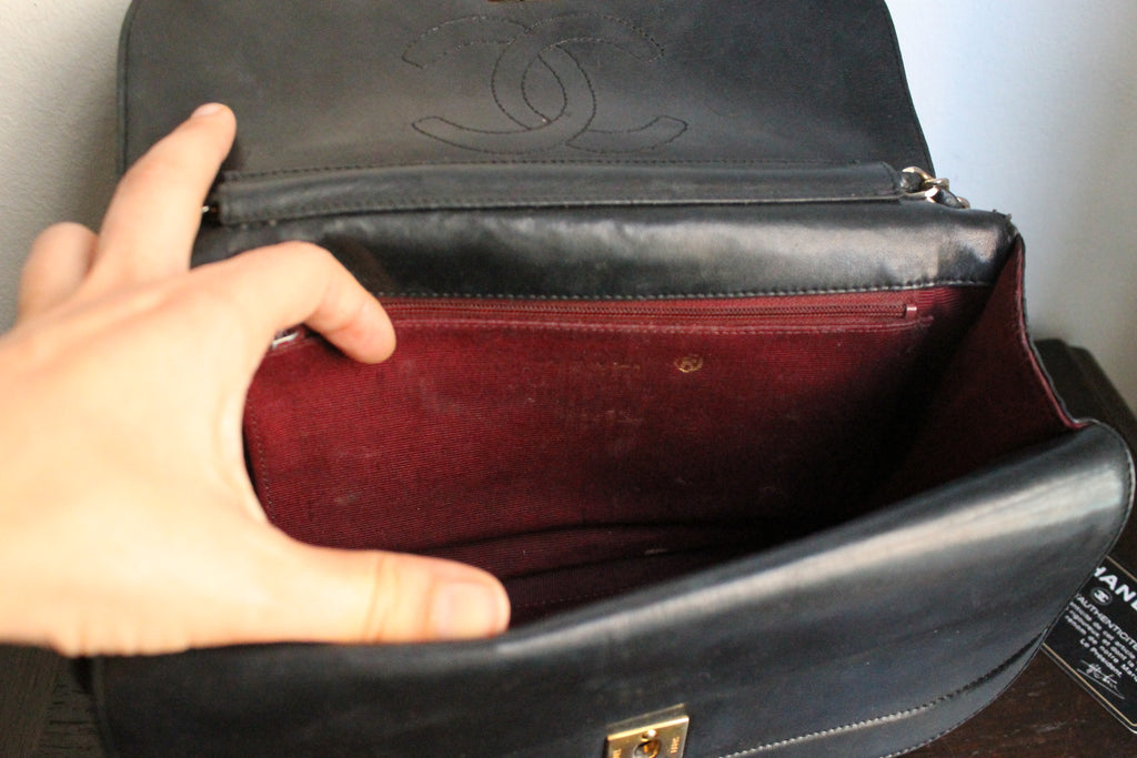 Chanel sac à main Timeless en cuir noir à rabat