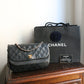 Chanel sac à main Timeless en cuir noir à rabat