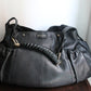 Yves Saint Laurent sac à main modèle Mombasa en cuir de lézard noir