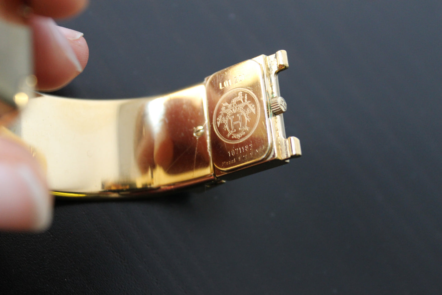 Hermès montre modèle loquet plaqué or