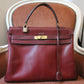 Hermès sac à main modèle Kelly 35 vintage en cuir box bordeaux