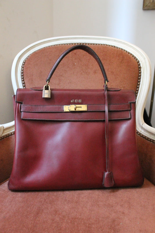 Hermès sac à main modèle Kelly 35 vintage en cuir box bordeaux