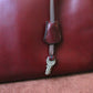 Hermès sac à main modèle Kelly 35 vintage en cuir box bordeaux