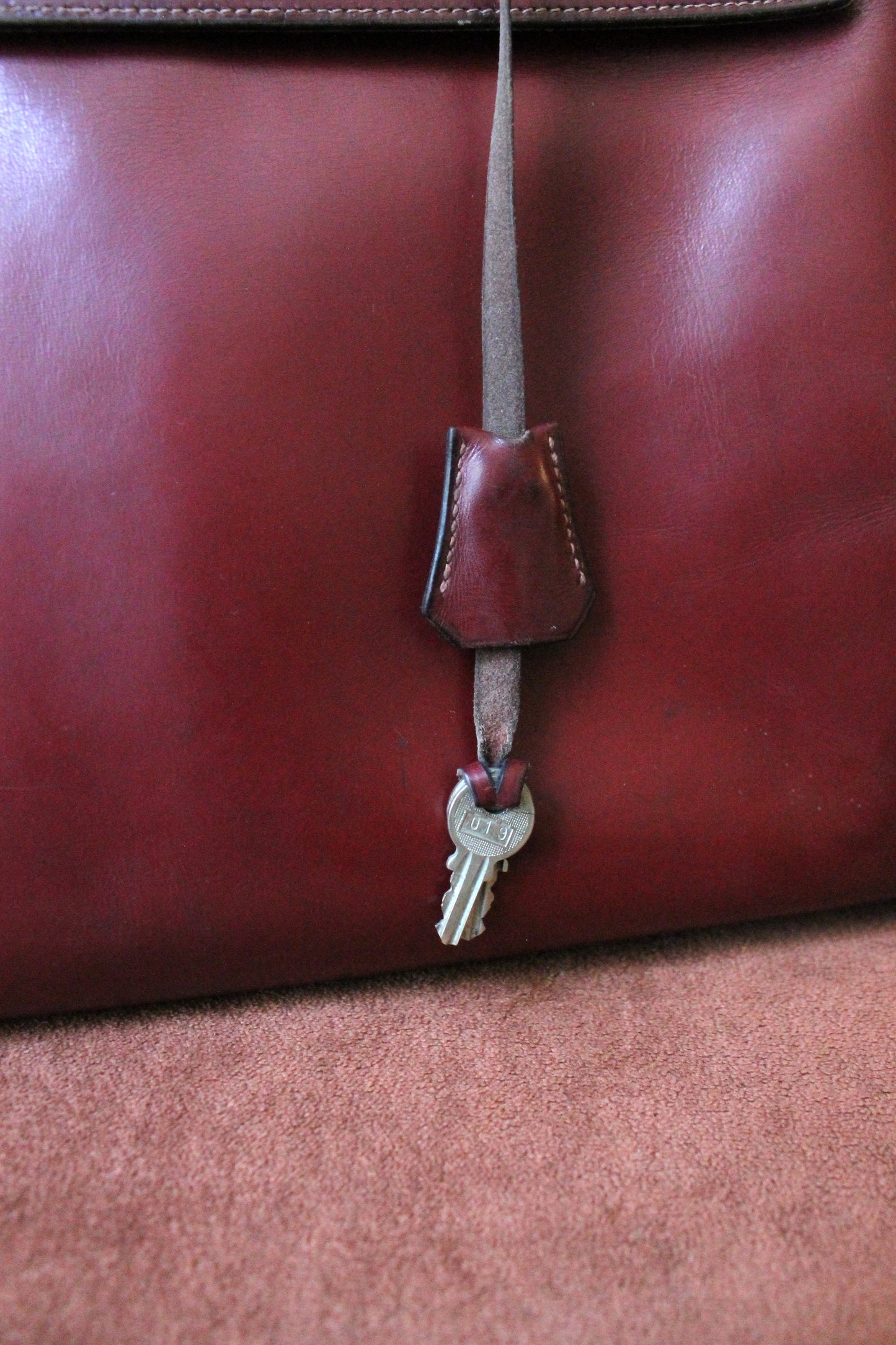 Hermès sac à main modèle Kelly 35 vintage en cuir box bordeaux