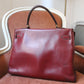 Hermès sac à main modèle Kelly 35 vintage en cuir box bordeaux