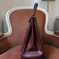 Hermès sac à main modèle Kelly 35 vintage en cuir box bordeaux