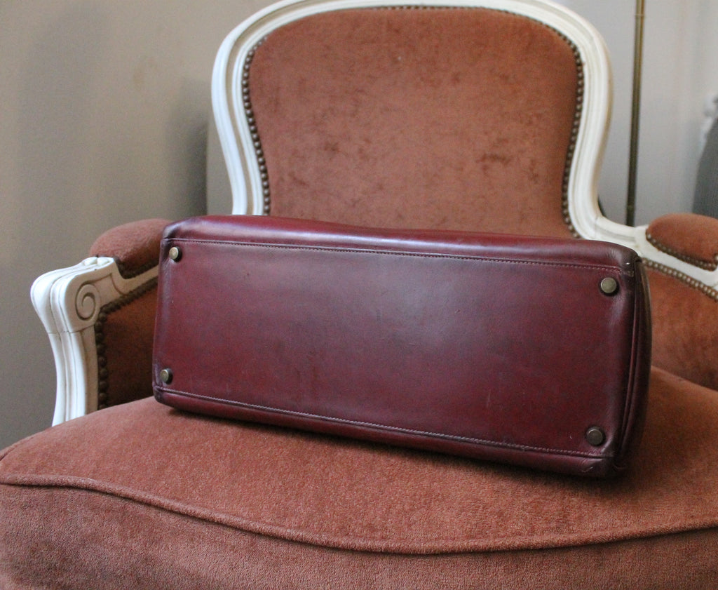 Hermès sac à main modèle Kelly 35 vintage en cuir box bordeaux