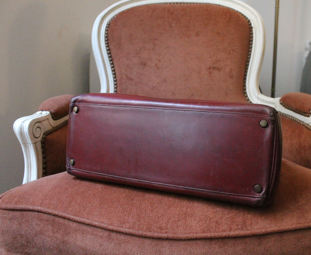 Hermès sac à main modèle Kelly 35 vintage en cuir box bordeaux