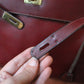 Hermès sac à main modèle Kelly 35 vintage en cuir box bordeaux