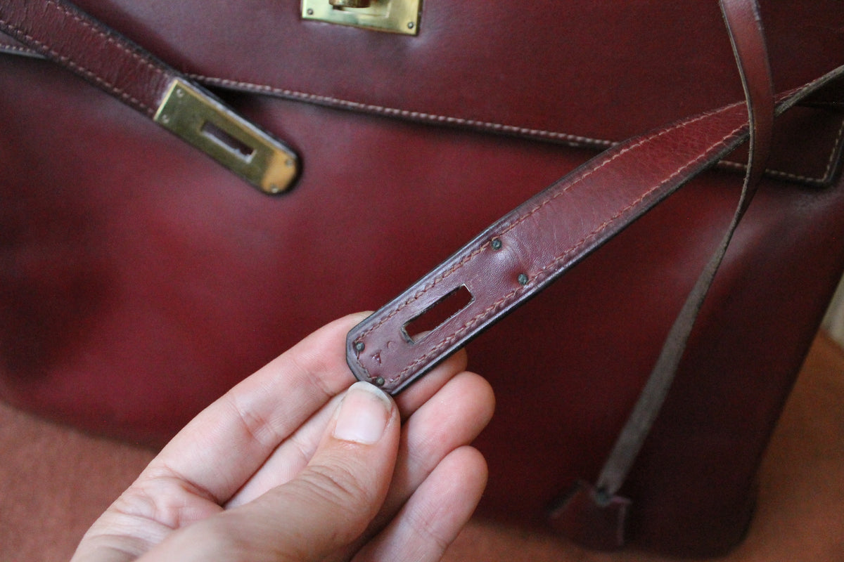 Hermès sac à main modèle Kelly 35 vintage en cuir box bordeaux