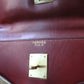Hermès sac à main modèle Kelly 35 vintage en cuir box bordeaux