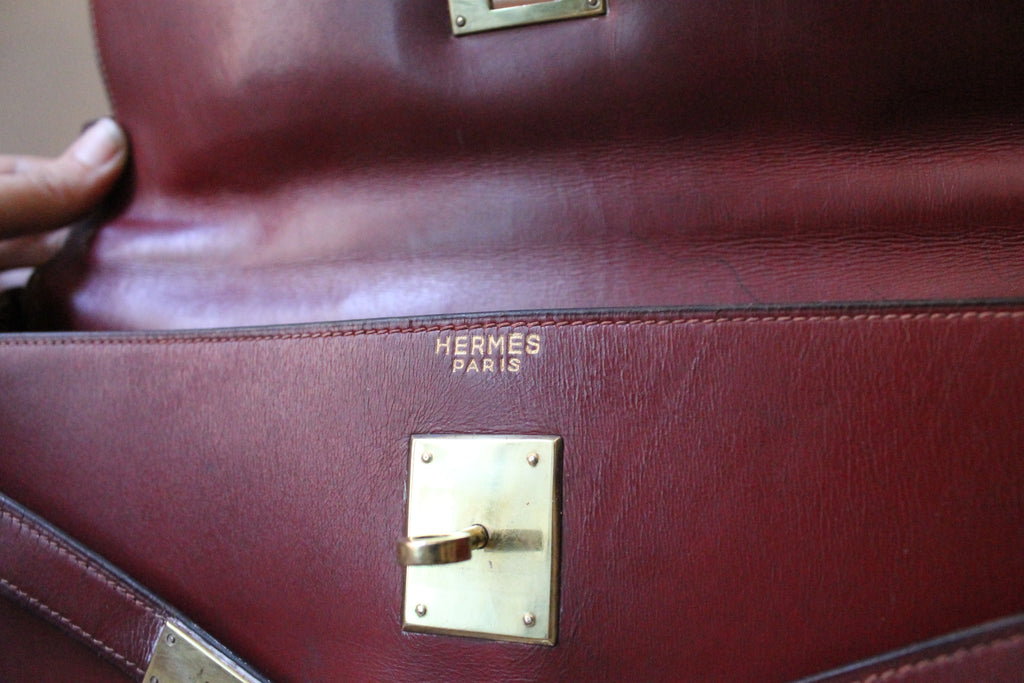Hermès sac à main modèle Kelly 35 vintage en cuir box bordeaux