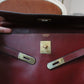 Hermès sac à main modèle Kelly 35 vintage en cuir box bordeaux