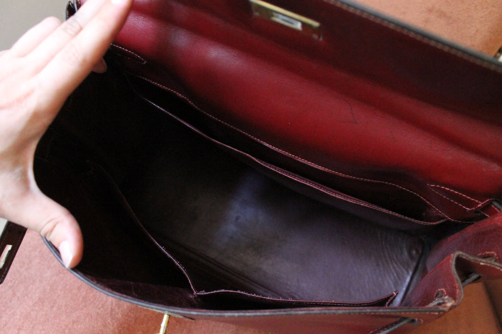 Hermès sac à main modèle Kelly 35 vintage en cuir box bordeaux
