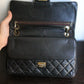 Chanel sac à main modèle "2.55" vintage à double rabat en cuir noir