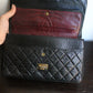 Chanel sac à main modèle "2.55" vintage à double rabat en cuir noir