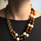 Chanel collier Gripoix en métal et perles marrons blanches