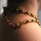 Chanel collier Gripoix en métal et perles marrons blanches