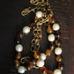 Chanel collier Gripoix en métal et perles marrons blanches