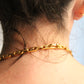 Céline collier en métal doré motif Triomphe