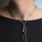 Chanel collier en métal argenté avec pendentif représentant coco chanel