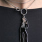 Chanel collier en métal argenté avec pendentif représentant coco chanel