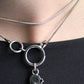 Chanel collier en métal argenté avec pendentif représentant coco chanel