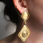 Chanel boucles d’oreilles pendantes à clip en métal doré cc