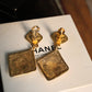 Chanel boucles d’oreilles pendantes à clip en métal doré cc