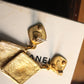 Chanel boucles d’oreilles pendantes à clip en métal doré cc