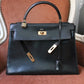 Hermès sac à main modèle Kelly 32 en cuir box noir