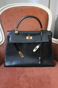 Hermès sac à main modèle Kelly 32 en cuir box noir