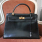 Hermès sac à main modèle Kelly 32 en cuir box noir