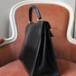 Hermès sac à main modèle Kelly 32 en cuir box noir
