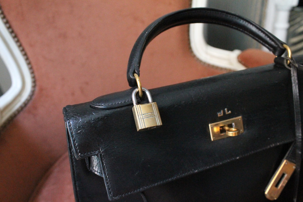 Hermès sac à main modèle Kelly 32 en cuir box noir