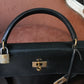 Hermès sac à main modèle Kelly 32 en cuir box noir