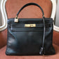Hermès sac à main modèle Kelly 28 en cuir box retourné noir