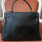 Hermès sac à main modèle Kelly 28 en cuir box retourné noir