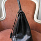 Hermès sac à main modèle Kelly 28 en cuir box retourné noir