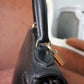 Hermès sac à main modèle Kelly 28 en cuir box retourné noir