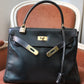 Hermès sac à main modèle Kelly 28 en cuir box retourné noir