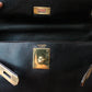 Hermès sac à main modèle Kelly 28 en cuir box retourné noir
