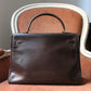 Hermès sac à main modèle Kelly 32 en cuir box marron