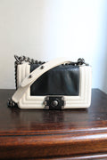 Chanel sac à main modèle Boy 20 cm en veau glacé noir et ivoire