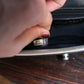 Chanel sac à main modèle Boy 20 cm en veau glacé noir et ivoire