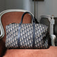 Dior sac à main bowling en toile Dior oblique bleu marine et beige