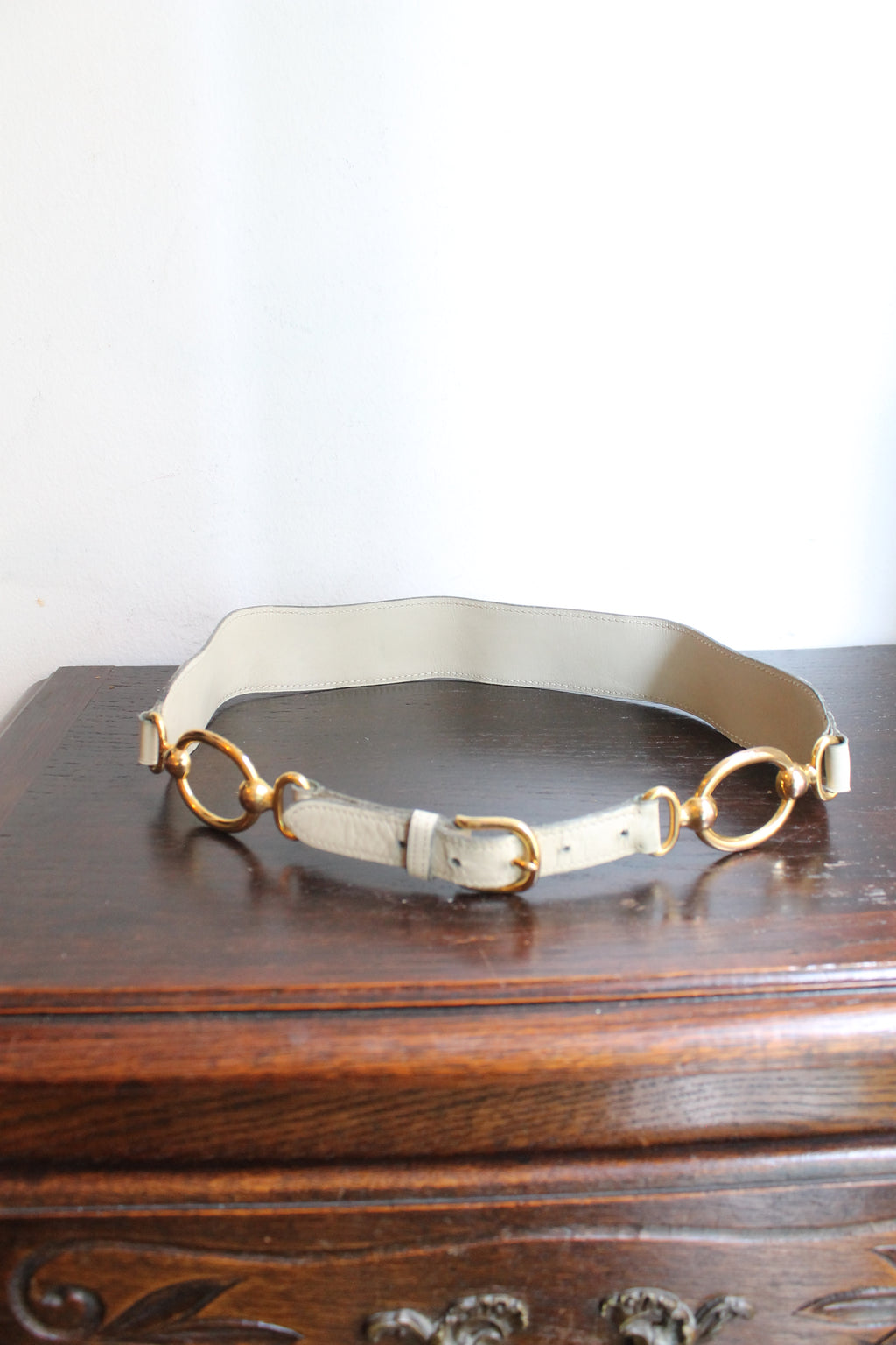 Hermès ceinture taille haute en cuir beige à décor d'anneaux dorés