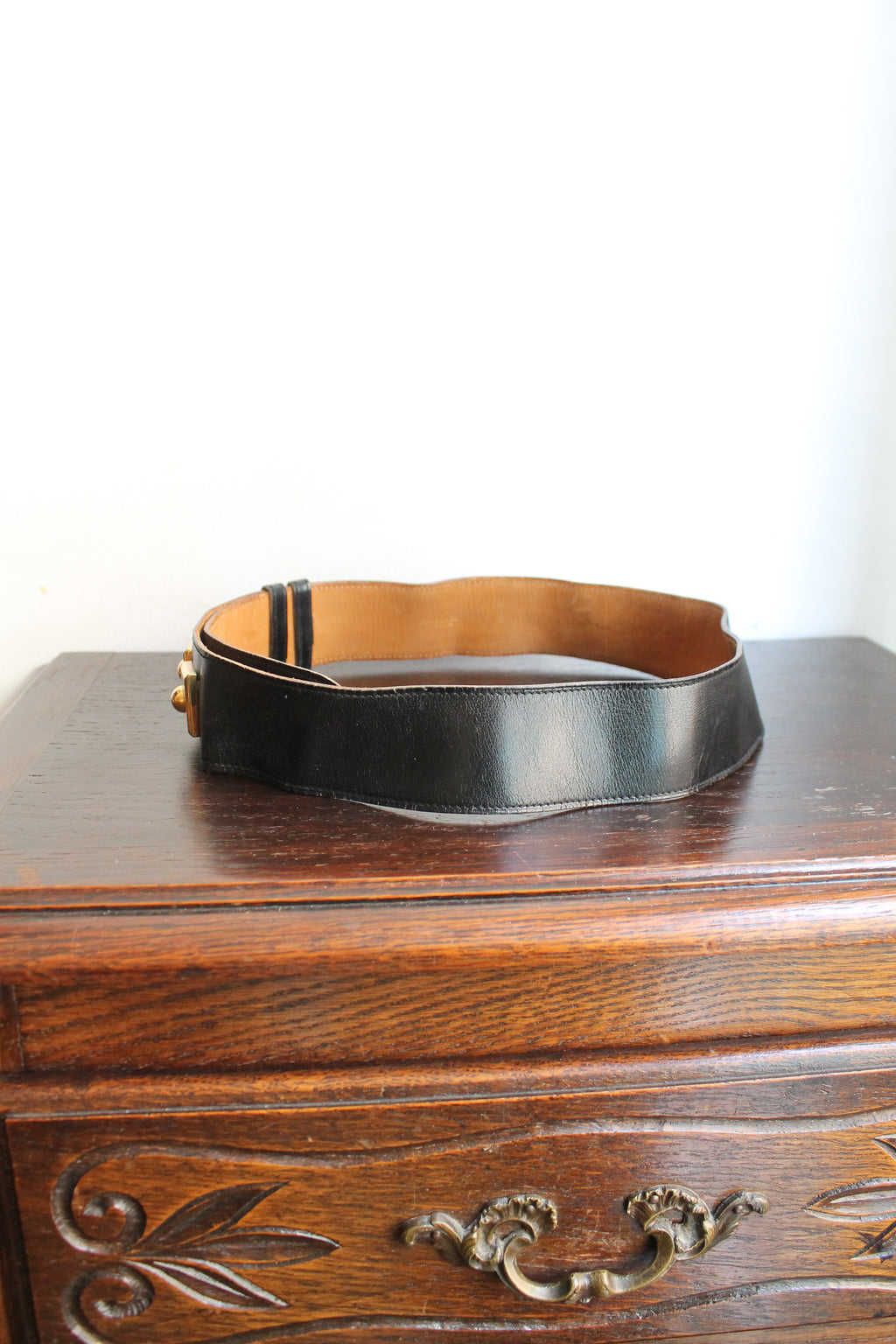 Hermès ceinture taille haute en cuir noir trois boutons en métal doré