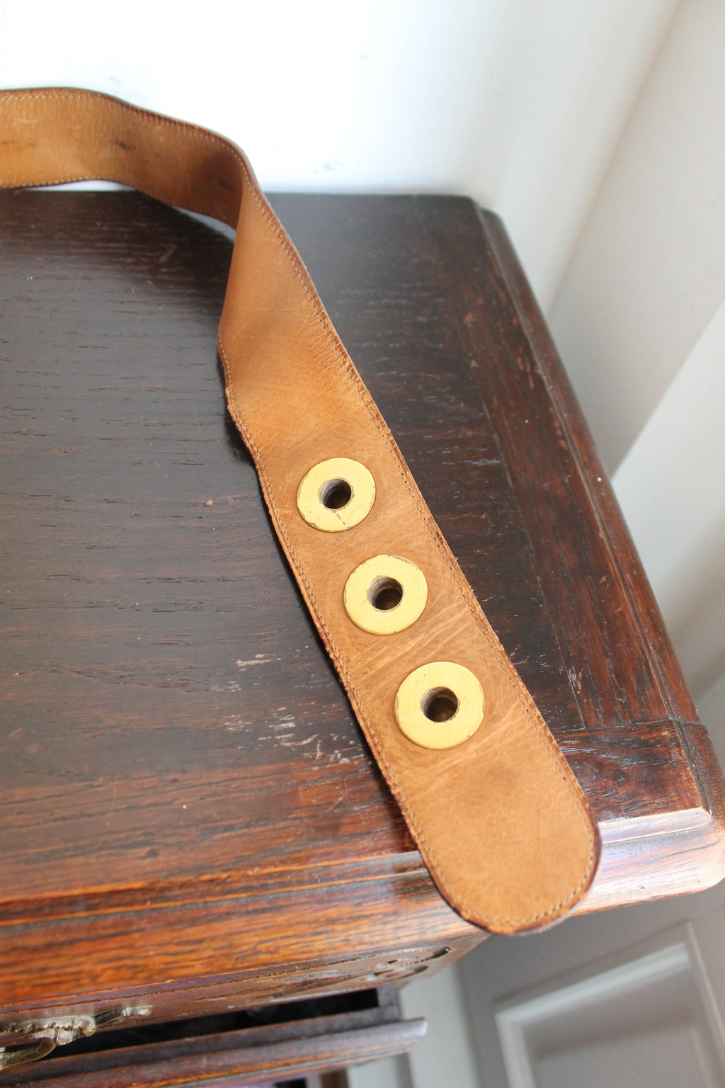Hermès ceinture taille haute en cuir noir trois boutons en métal doré